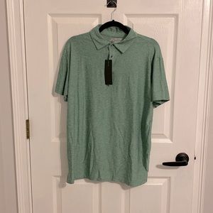 NWT men’s polo in green size Medium never worn. From smoke/pet free home